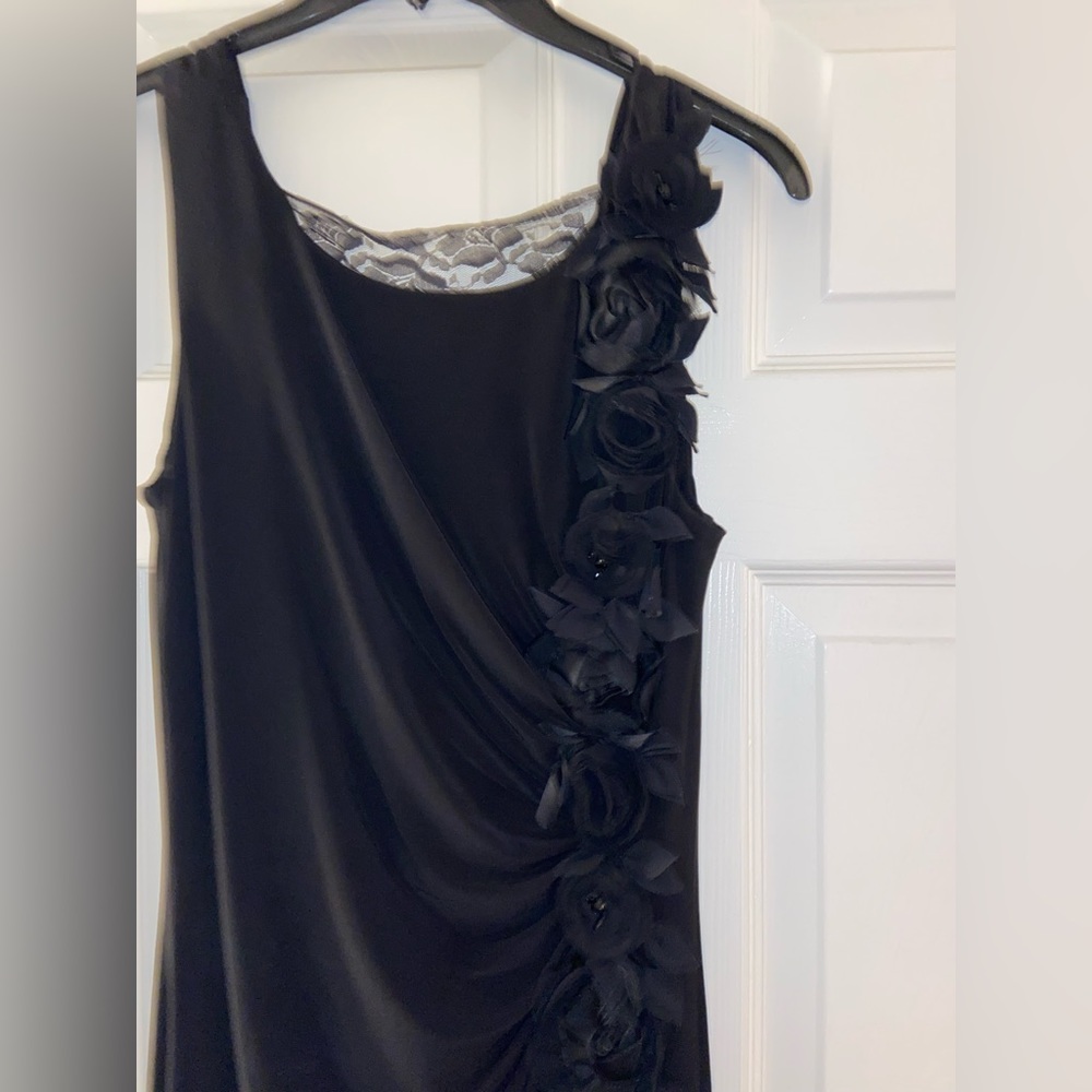 long formal black dress with lace and flower embellishments
